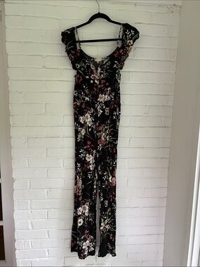 Altar'd State Black Floral Ruffled Off-Shoulder Flowy Jumpsuit